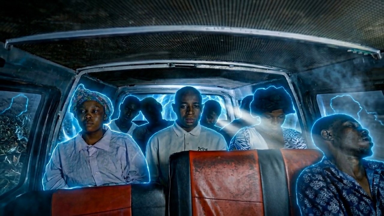 Passengers inside a van surrounded by blue energy, with seats and windows defining the space